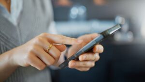 Smartphone, marketing and business hand contact information, website application or reading target